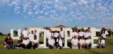 Volunteers and supporters gather for a group photo beside the HOPE balloon before the start of the event at West Hills College Lemoore.